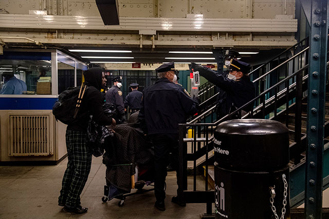 NYPD throws people off the subway at Bronx station, 6
            May 2020. (Photo: New York Times)