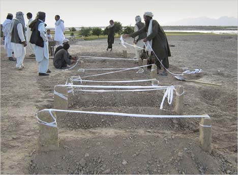 Fresh graves of villagers killed in May 5 U.S. air strike in Farah province, western Afghanistan, where more than 125 were killed, including many women and children. (Photo: AP)