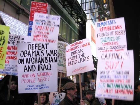 Internationalist contingent at December 2 Times Square New York City protest over U.S. escalation of war on Afghanistan. (Internationalist photo)