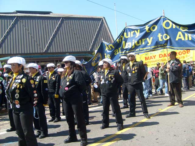 ILWU drill team at May Day march, 080501. Internationalist photo