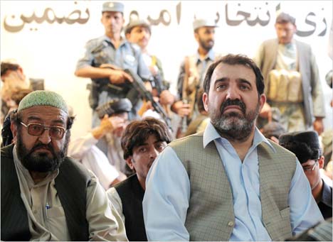 Corruption in Afghan puppet government? Shocking! But main agent of corruption in Kabul regime, Ahmed Wali Karzai (at right), the president's brother, turns out to be on the CIA payroll. (Photo: Banaras Khan/AFP)