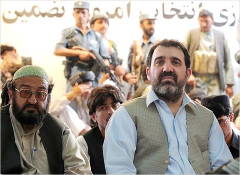 corruption in afghan puppet government? shocking! but main agent of corruption in kabul regime, ahmed wali karzai (at right), the president's brother, turns out to be on the cia payroll. (photo: banaras khan/afp)