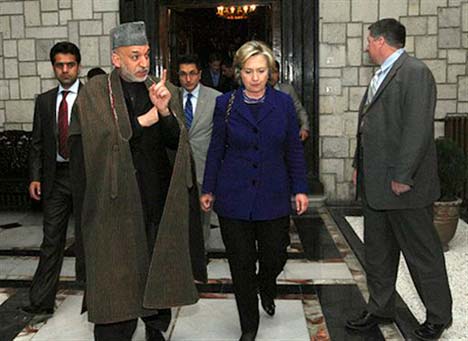 Afghan puppet president Hamid Karzai and U.S. puppet mistress Hillary Clinton in Kabul, November 2009. (Photo: U.S. embassy)