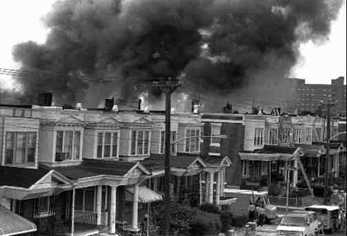 Philadelphia police firebombing of MOVE commune, 13 May 1985. AP photo