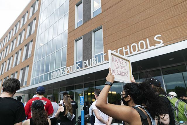 Demonstration outside meeting of Minneapolis school
                board, June 1, calling for police out of the schools.
                (Photo: Ben Hovland)