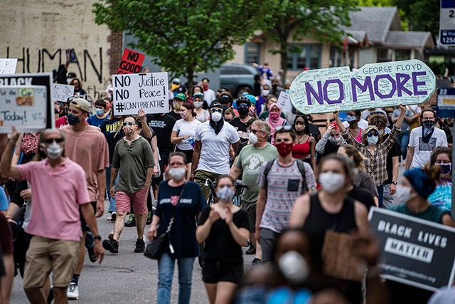 Thousands march from site where George Floyd was killed
to Minneapolis Police Department's 3rd Precinct, 26 May
2020. (Photo: Carlos Gonzalez / Star Tribune)