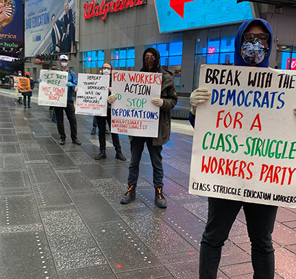 Internationalist protesters in NYC's Times Square call
            to close I.C.E. concentration camps, 24 April 2020.