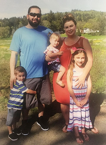 Byron and Megan
                Jacobs and their children (from left) Phoenix, Monroe
                and Harlow. Photo courtesy Megan Jacobs.